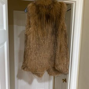 Fur jacket,light brown w/ side pockets.